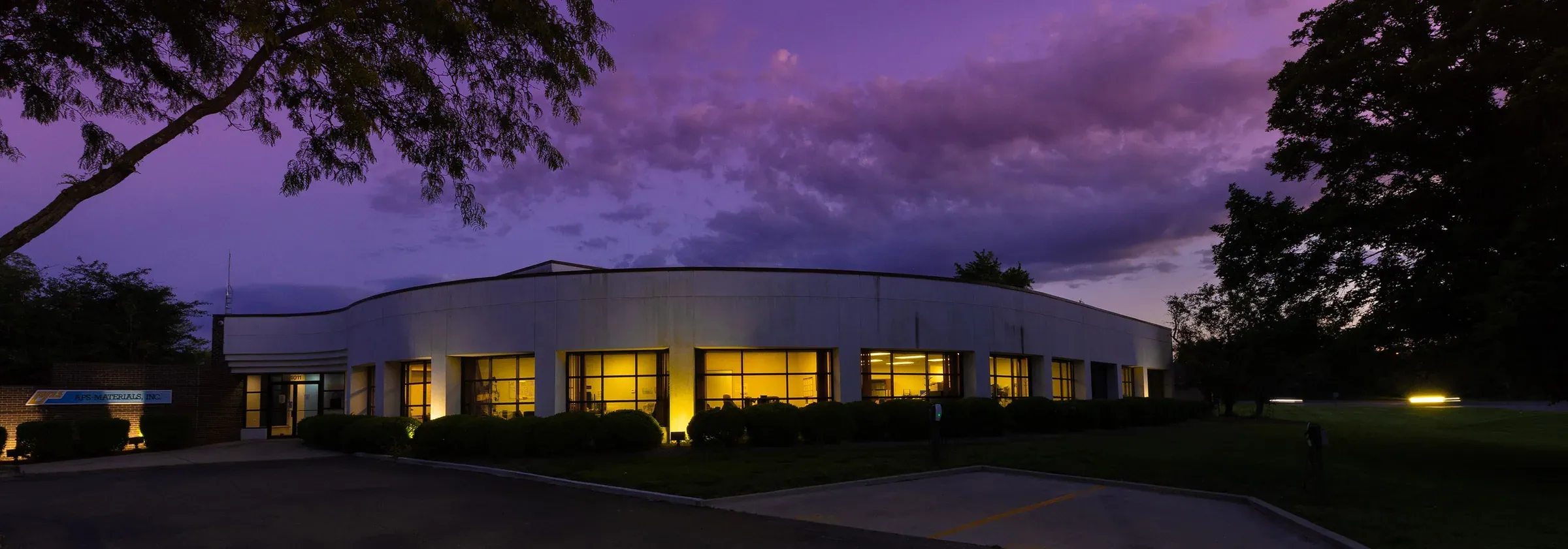 APS Materials headquarters in Dayton, Ohio at dusk