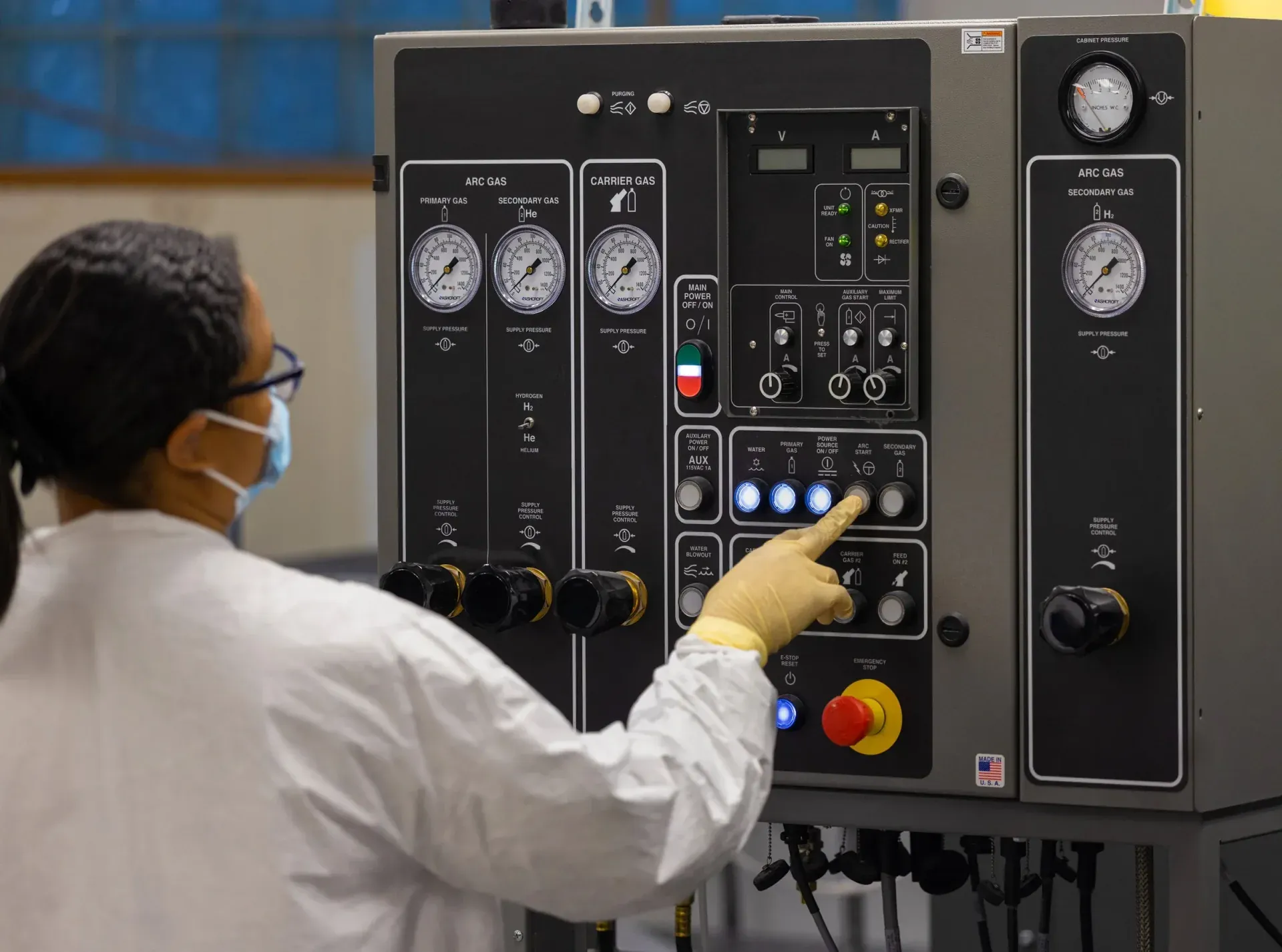 Operator running a thermal spray cell at the Dayton facility