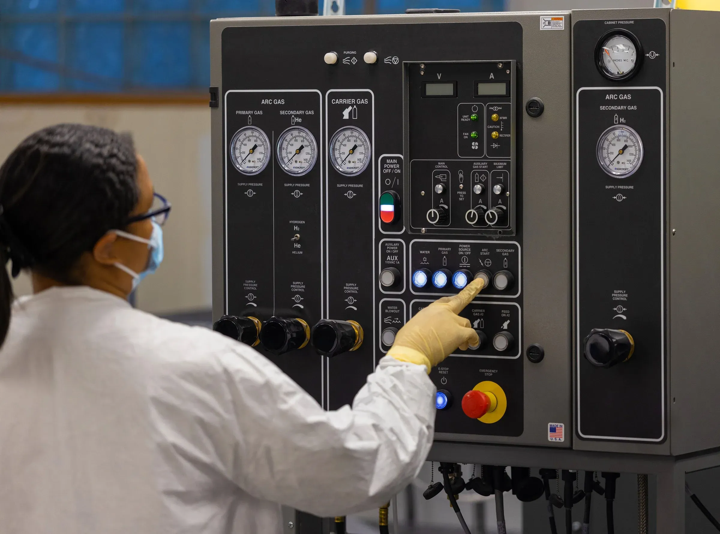 Operator running a thermal spray cell at the Dayton facility