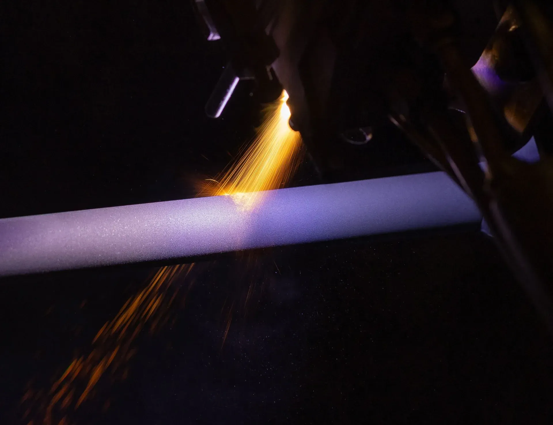 Plasma spray coating applied to a rotating cylindrical component