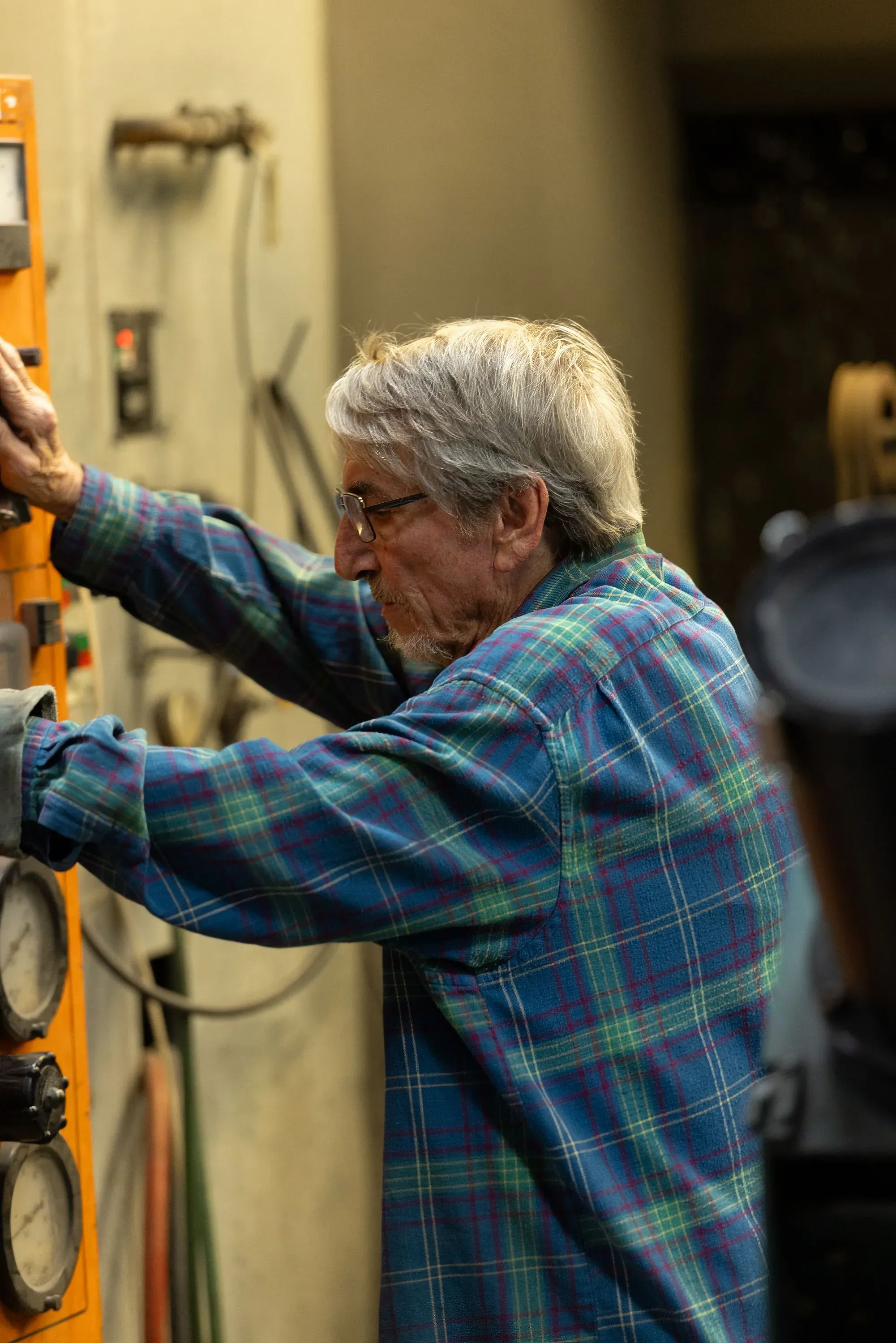 Operator adjusting thermal spray process controls