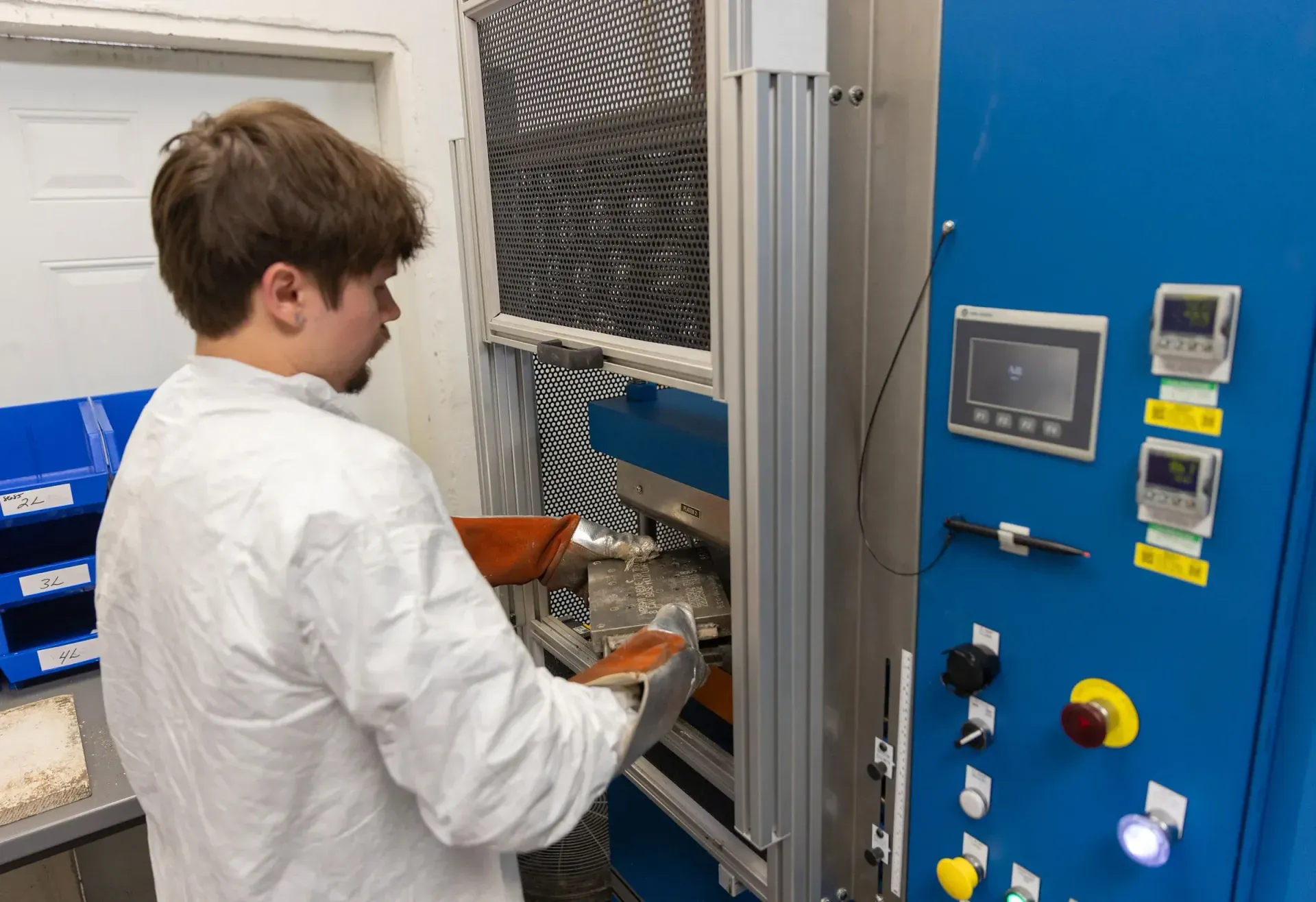 Heated compression molding press forming silicone components