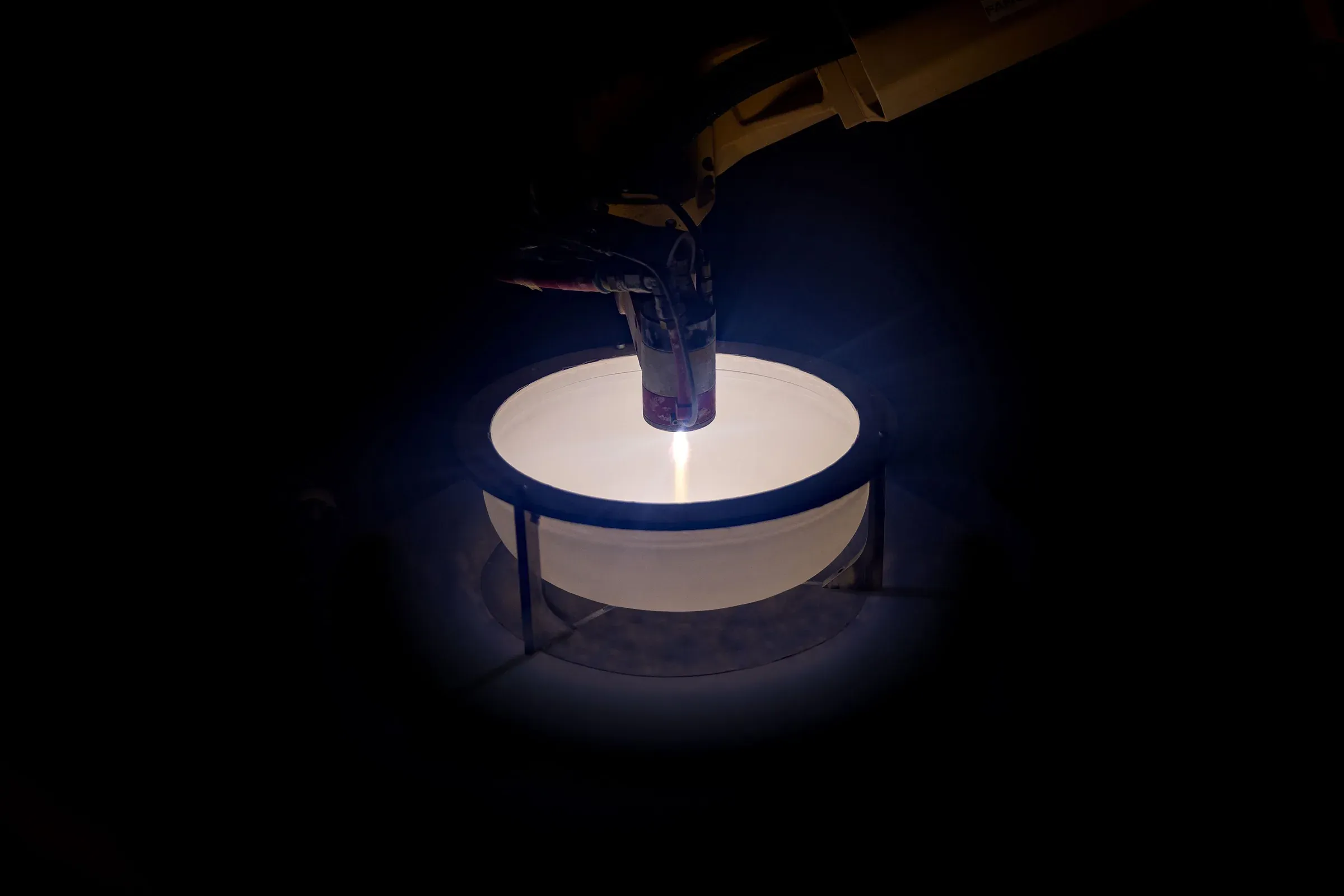 Plasma spray coating a semiconductor bell jar