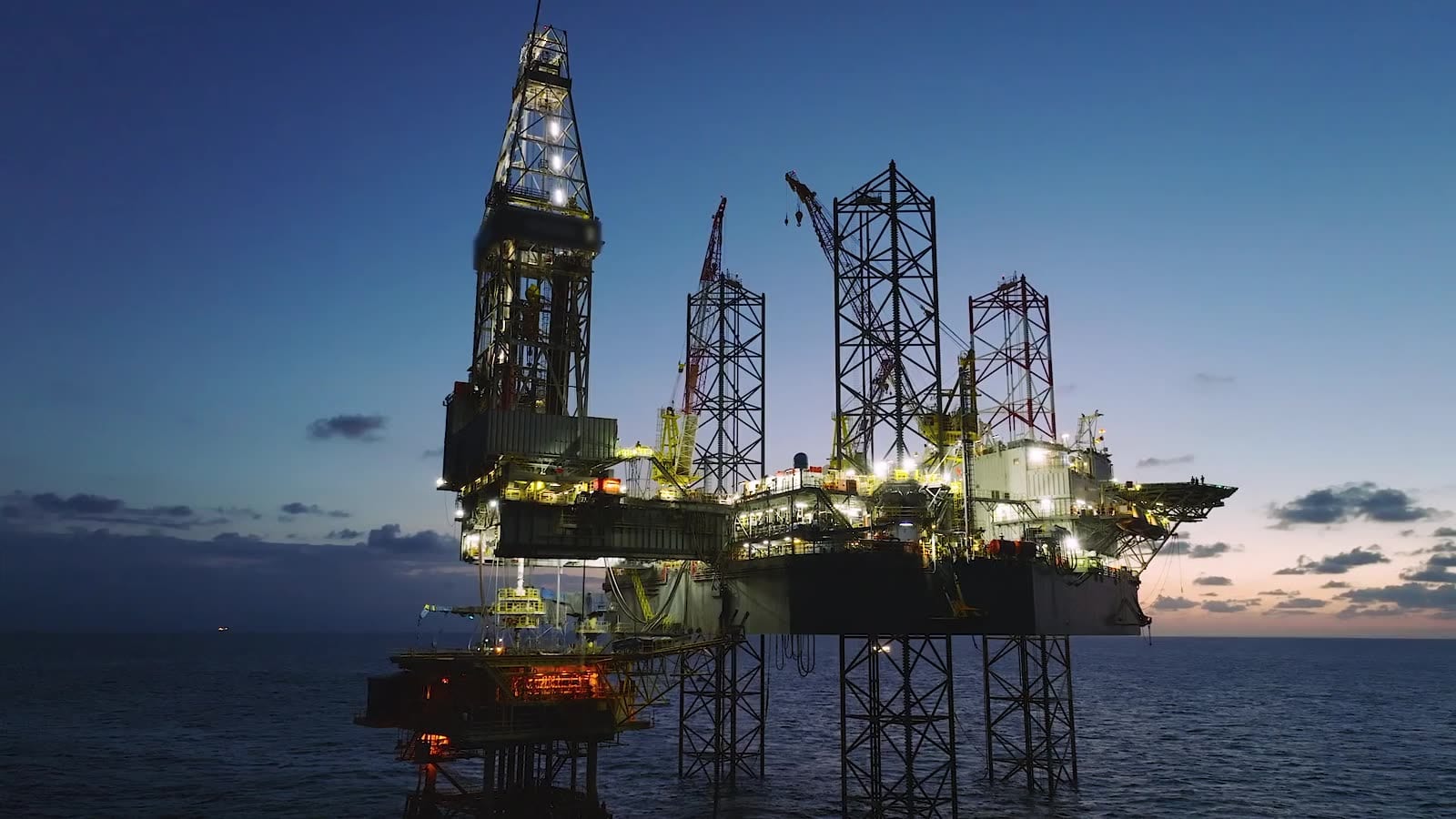 Offshore drilling platform at dusk